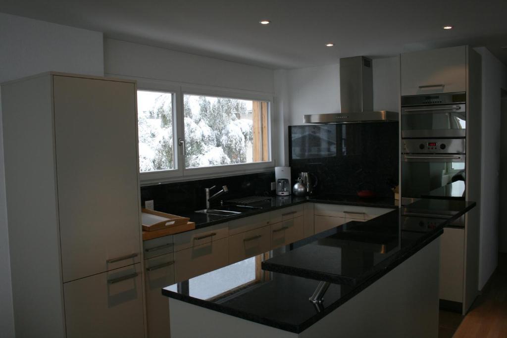 Haus Rufinis Apartment Klosters Phòng bức ảnh